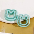 Macro view of mint green hollow bunny resin charms for DIY earring and hair accessory - Lake Green Rabbit