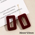 Close-up of rectangle velvet jewelry pendants in burgundy red with gold metal rods - Medium Rectangle (Size 13, 1 Piece)