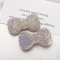 Dettaglio di fiocchi in resina glitterata con paillettes iridescenti per gioielli fai-da-te - Viola Chiaro