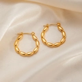 Polished gold coffee bean hoop earrings on white silk fabric for a luxury look - Rice Bead Hoop Earrings 0251