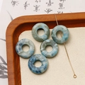 Makroaufnahme von runden Natursteinperlen mit blauer Marmortextur für DIY-Schmuck - Blaugrünes Meeresmuster (Stil 6) / 1 Stück (20x20mm)