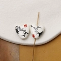 Detailed view of heart-shaped ceramic beads with ink-style leaf painting for DIY jewelry - Black Ink Wash Flower & Bird Style (Pattern 18) / 1 Piece