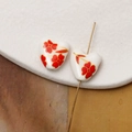 Macro shot of heart-shaped ceramic beads with red floral patterns for DIY jewelry making - Red Five-Petal Flower with Gold Edge Style (Pattern 14) / 1 Piece