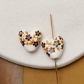 Detail showing heart-shaped ceramic beads with hand-painted black flowers and orange leaves - Black Flower & Orange Leaf Vintage Style (Pattern 5) / 1 Piece