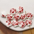Macro shot of white flower ceramic beads with hand-painted red plum floral patterns - Dark Red (9#)