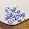 Detailed view of hand-painted blue floral ceramic beads for DIY jewelry making - Blue (6#)