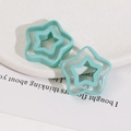 Pair of mint green hollow star resin accessories for DIY hair clips and jewelry making - Pentagram / Lake Green
