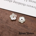 Macro detail of 8mm pearlescent flower acrylic beads with iridescent finish and hole - Small 5-Petal Flower Shape (9#)