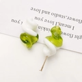 Detailed macro view of spiral glass beads in white and green for DIY jewelry making - 1 Piece / Fruit Green