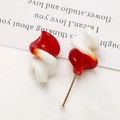Macro detail of red and white spiral glass beads with a gold metal jewelry pin - 1 Piece / Red