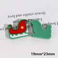 Detailed view of red and green Christmas sleigh DIY resin charms sized 19mm by 23mm - Christmas Car