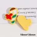 Detailed macro view of 18x26mm Christmas candy cane resin charms for DIY jewelry making - Christmas Candy Cane