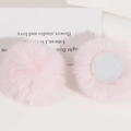 Close-up of pink 50mm faux rabbit fur balls with white flat base for DIY hair accessories - Light Pink