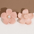 Detail of pink flocked flower charms with center faux pearl and smooth resin base - Light Pink