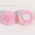 Detail view of 50mm soft pink faux rabbit fur pom poms with round bases for DIY hair clips - Deep Pink