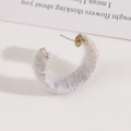 Detail of C-shaped earring wrapped in light grey plush mixed yarn with metal stud - Light Purple