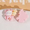 Macro shot of pink flocked dragon resin patches for DIY jewelry with yellow stars - Pink Star Style
