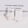 Detail eines weißen beflockten Bären-Zubehörs mit Vordertextur und flacher Rückseite - Weißer Bär Mit Tasche