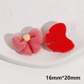 Detail view of 16mm*20mm flocked bow DIY jewelry parts in pink and red resin material - Flocked Bow