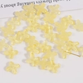 Macro view of translucent light yellow glass flower beads for DIY jewelry making - 1 Piece / Yellow