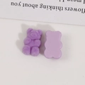 Detail showing plush purple bear DIY charms with flocking texture and smooth back - Purple