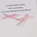 Detailed view of handmade pink velvet ribbon bows for DIY hair accessories and earrings - Deep Pink
