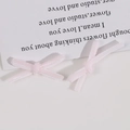 Detailed macro view of two handmade light pink ribbed grosgrain ribbon bows for DIY hair crafts - Light Pink