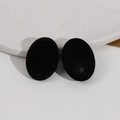 Detail of black flocked oval resin charm with pre-drilled hole for DIY jewelry making - Black (Velvet)