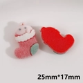 Macro detail of flocked Christmas sock resin patch with adhesive backing and 25mm*17mm size - Red Christmas Sock
