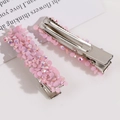 Dettaglio di fermagli per capelli in cristallo rosa AB con paillettes su base metallo - Rosa