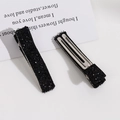 Détail de barrettes à cheveux à paillettes noires avec base en métal argenté brillant - Noir