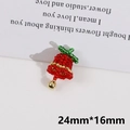 Detail van rood en groen kralen kerstbelletje met gouden metalen klepel, 24 mm x 16 mm - Kleine Rode Bel