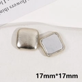 Detail view of 17mm square champagne gold faux leather buttons with silver backing - Gold Square Style