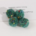 Detail of teal plush geometric craft balls with colorful speckled wool texture - 1 Piece / Green