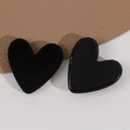 Dettaglio di accessori fai-da-te a forma di cuore in floccato nero opaco e resina lucida - Nero