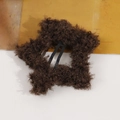 Detail of dark brown plush star hair clip with soft faux fur texture and metal BB clip - Dark Coffee