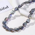 Macro shot of iridescent faceted glass beads for jewelry making with oil-slick metallic finish - Irregular Faceted Style (11#) / 1 Piece / Violet Blue