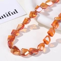 Macro shot of iridescent AB coated orange irregular faceted glass beads for jewelry DIY - Irregular Faceted Style (12#) / 1 Piece / Orange