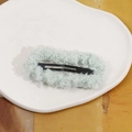 Plush light mint green lamb wool metal BB hair clip on a decorative white plate - Light Green