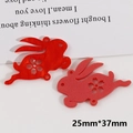 Detail of red acrylic rabbit charms with cherry blossom patterns for DIY jewelry crafts - Red Running Rabbit Style