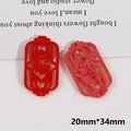 Detail of red lantern charms with Fu character cutout for DIY festive jewelry making - Red Lantern Fu Character Style