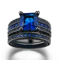 Double-layered black metal ring set featuring a square blue gem and micro-paved blue stones - US 5 / Black Gold Blue Stone