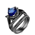 Dubbellaagse zwart gouden ringenset met blauwe saffier en sprankelende witte zirkoon - US 5 / Zwart Goud Blauwe Steen