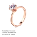 Detailed close-up of 6mm round zircon stone on rose gold six-prong bridal ring - 6 / 6mm Solitaire Six-Prong Rose Gold Style (R014)