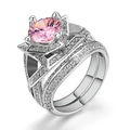 Dubbellaagse zilveren ringenset met een grote roze zirkoon en micro-pave details - US 5 / Wit Goud Toon Roze Steen