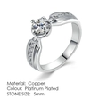 Platinum plated copper ring with 5mm cubic zirconia and side stones in a four-prong setting - 6 / 5mm Four-Prong Pave Row Style (R512)