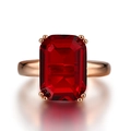 Luxurious rose gold ring with a large rectangular emerald-cut red gemstone and 4-prong setting - Number 6 / Rose Gold Red Stone