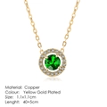 Yellow gold plated necklace with a round green gemstone pendant and zircon accents - Emerald Green Halo Circle Style (N103)