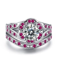Prachtige bruidsringset met roze korund bloemontwerp en sprankelende zirkonia pavé - US 5 / Witgoud Met Magenta Steen