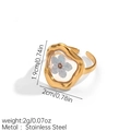Detailed view of the 1.9cm x 2cm gold stainless steel ring with a blue dried flower inlay - Irregular Wavy Light Blue Dried Flower (JDR256172-5)